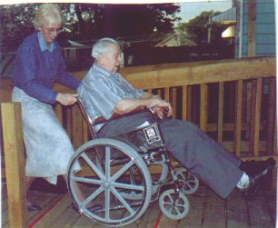 Wheelchair tilted back, front wheels rolled forward